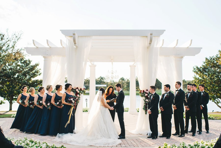 An Elegant Burgundy and Navy Fairytale Orlando Wedding Day via TheELD.com