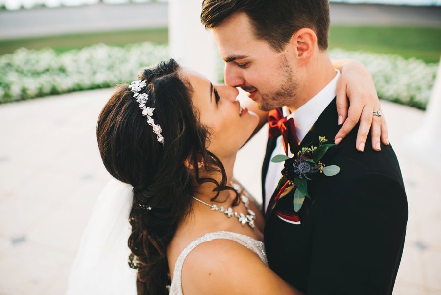 An Elegant Burgundy and Navy Fairytale Orlando Wedding Day via TheELD.com