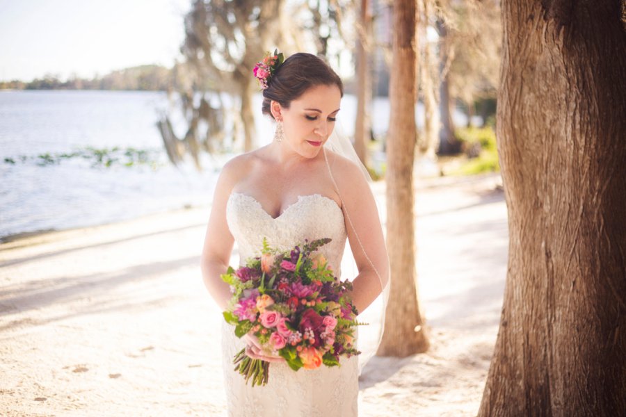 A Colorful Floral Waterfront Central Florida Wedding Day via TheELD.com