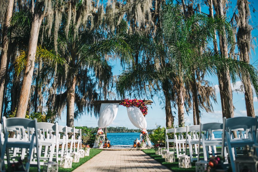 A Colorful Floral Waterfront Central Florida Wedding Day via TheELD.com