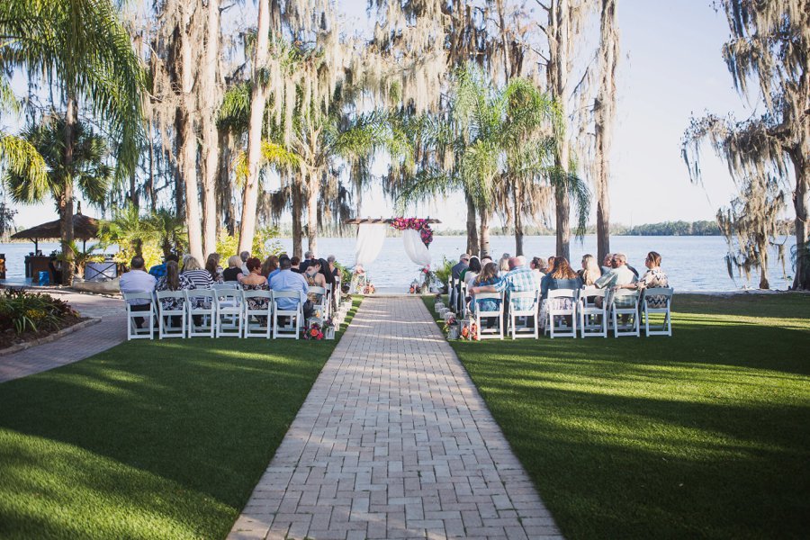 A Colorful Floral Waterfront Central Florida Wedding Day via TheELD.com