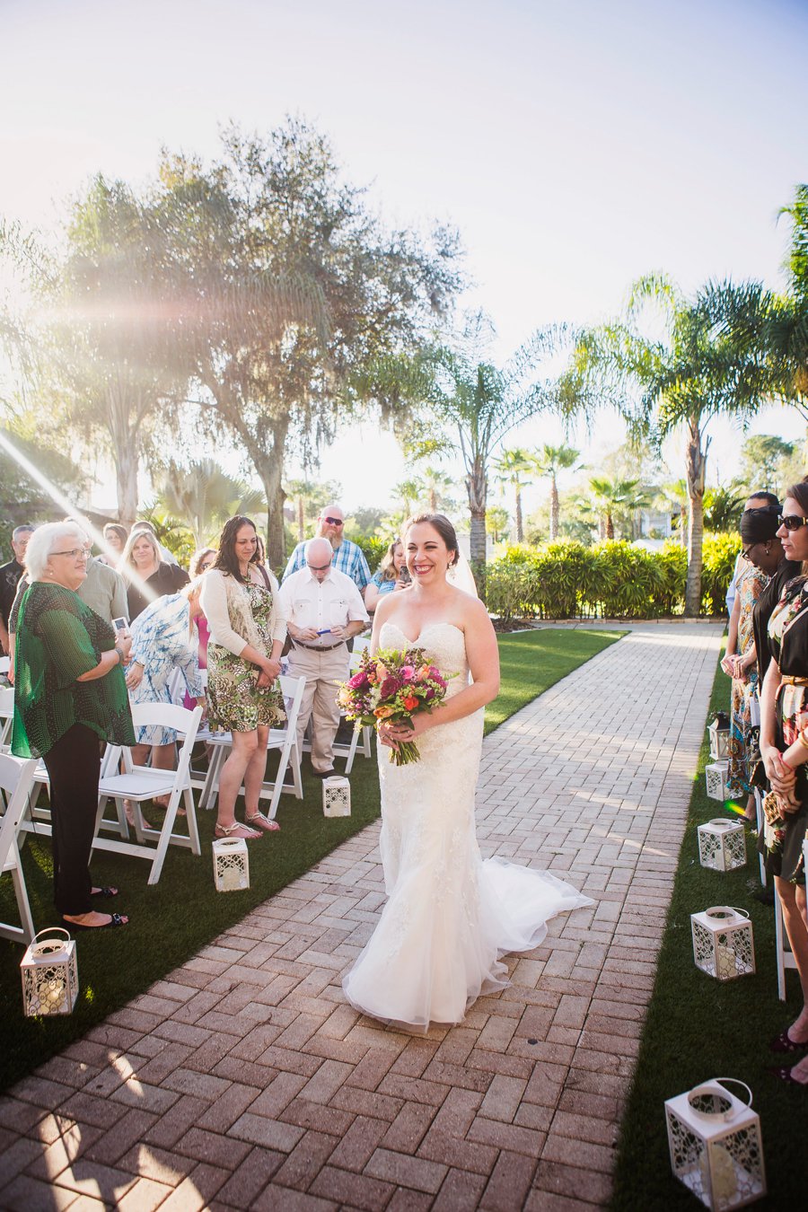 A Colorful Floral Waterfront Central Florida Wedding Day via TheELD.com