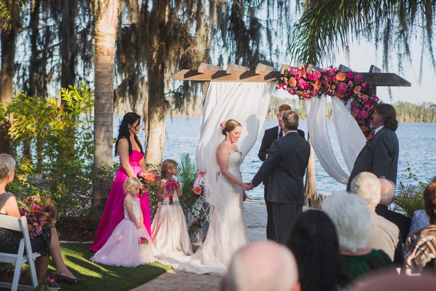 A Colorful Floral Waterfront Central Florida Wedding Day via TheELD.com