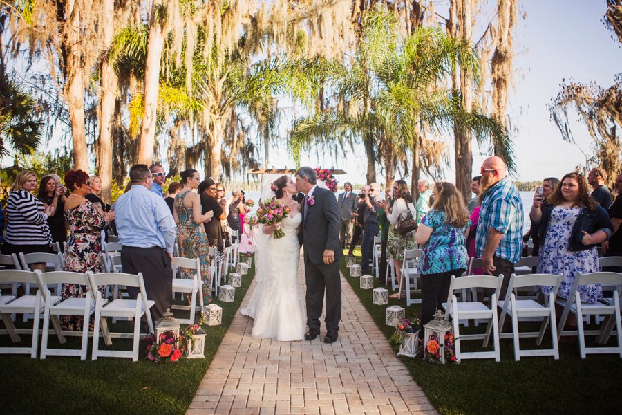 A Colorful Floral Waterfront Central Florida Wedding Day via TheELD.com