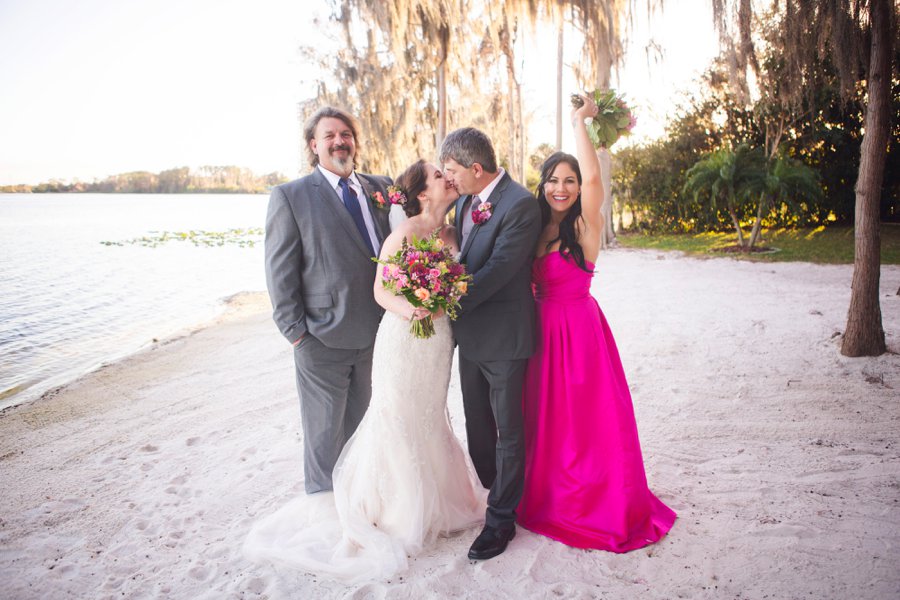 A Colorful Floral Waterfront Central Florida Wedding Day via TheELD.com