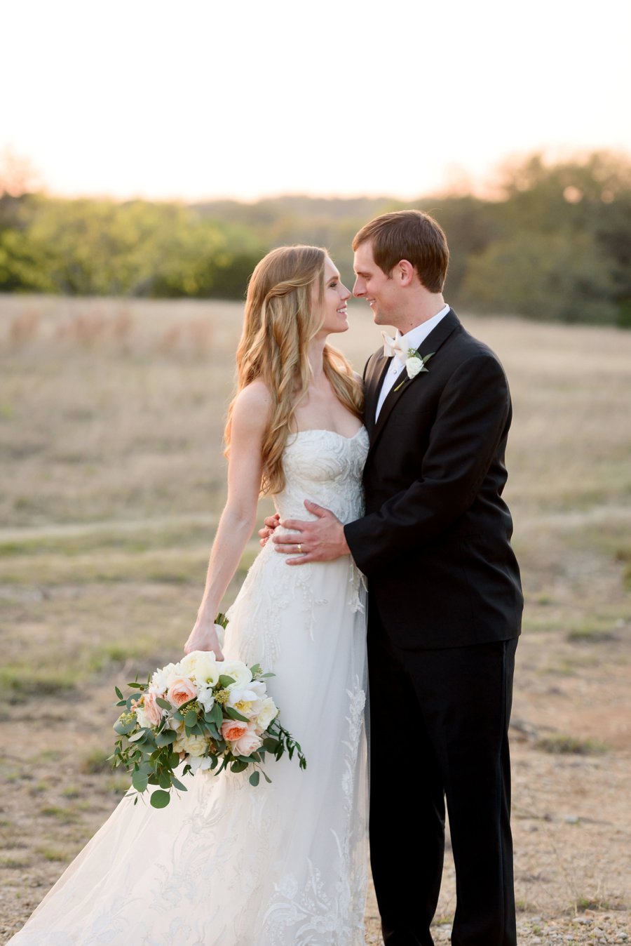 An Elegant Blush & Peach Whimsical Texas Wedding via TheELD.com