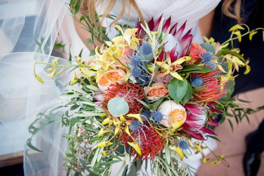 Colorful Navy, Yellow, and Orange Wedding Ideas via TheELD.com