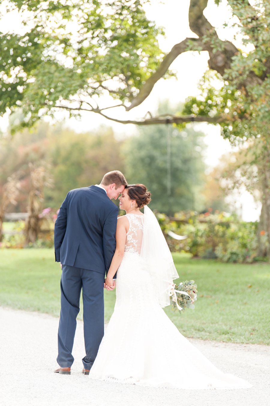 A Cozy, Romantic Blush and Red Indiana Wedding via TheELD.com