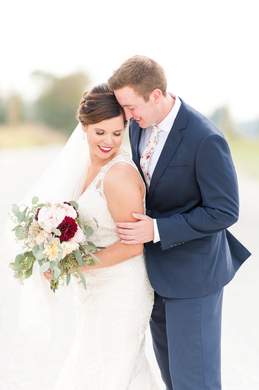 A Cozy, Romantic Blush and Red Indiana Wedding via TheELD.com