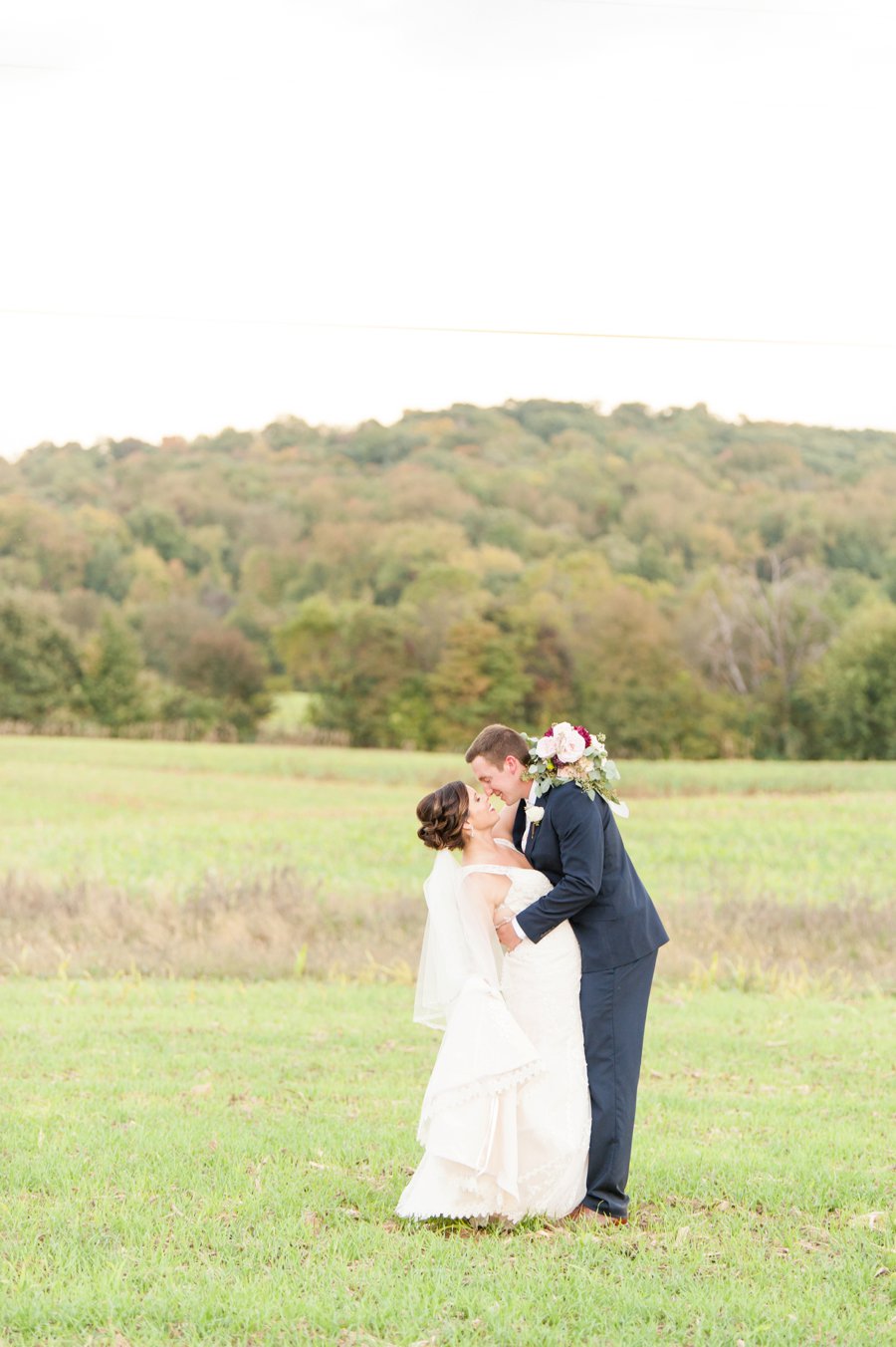 A Cozy, Romantic Blush and Red Indiana Wedding via TheELD.com