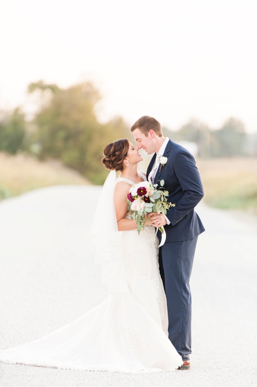 A Cozy, Romantic Blush and Red Indiana Wedding via TheELD.com