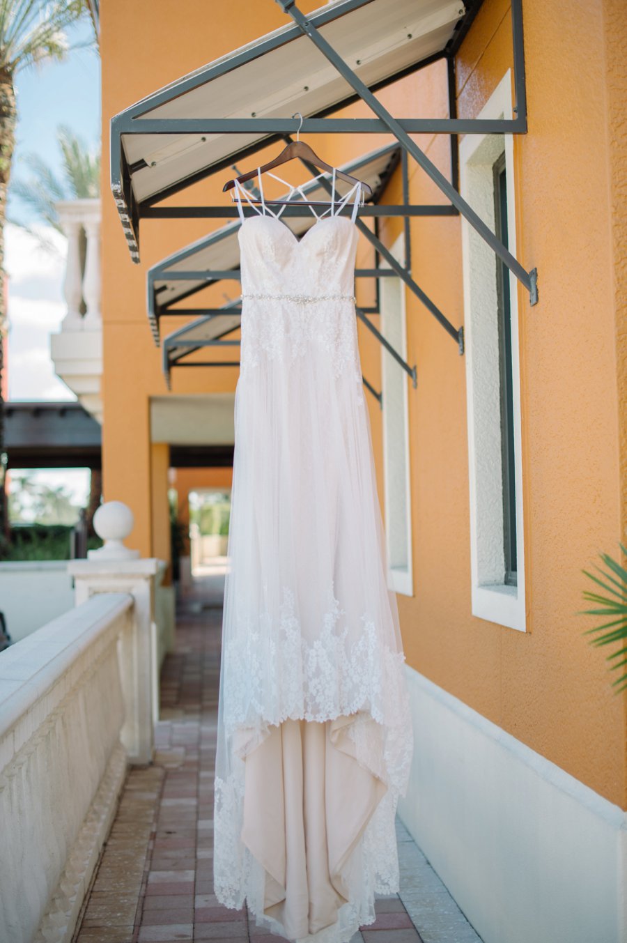 A Colorful Navy, Orange, & Pink Preppy Naples Wedding Day via TheELD.com