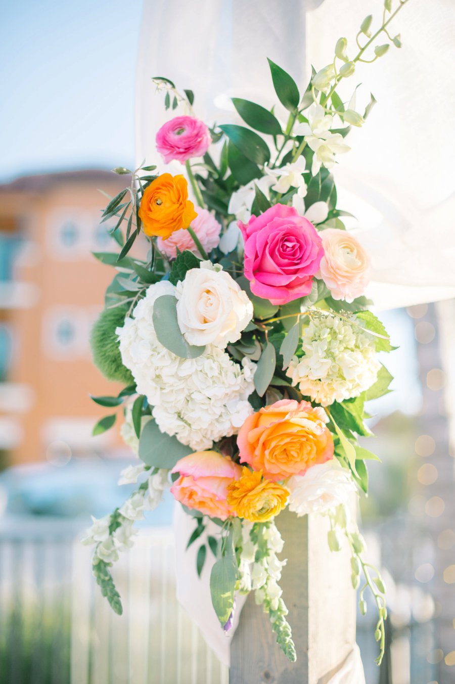 A Colorful Navy, Orange, & Pink Preppy Naples Wedding Day via TheELD.com