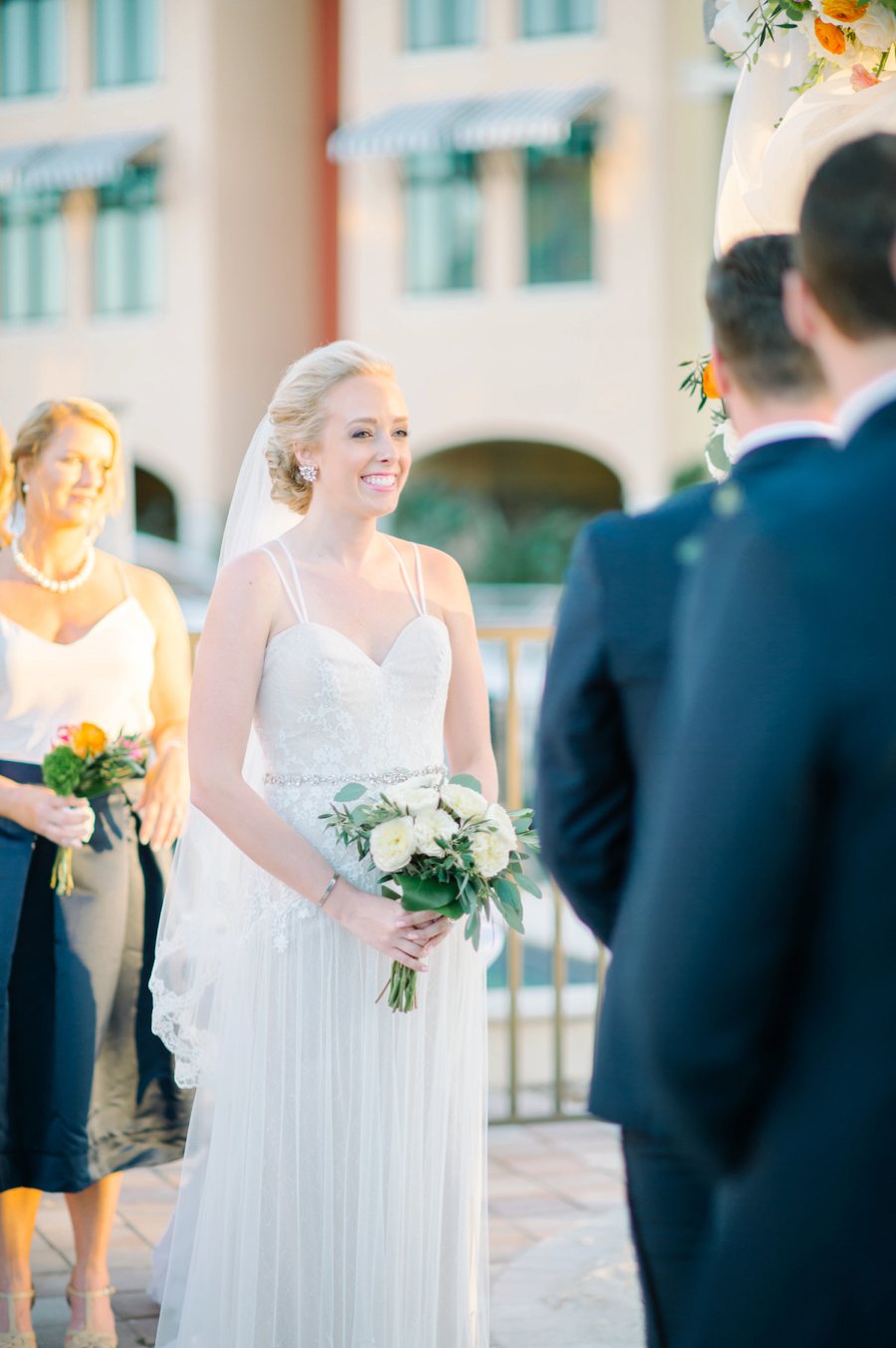 A Colorful Navy, Orange, & Pink Preppy Naples Wedding Day via TheELD.com