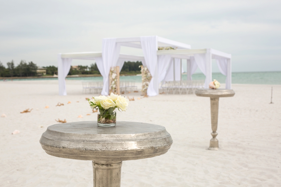 An Elegant & Luxe White Beach Wedding via TheELD.com