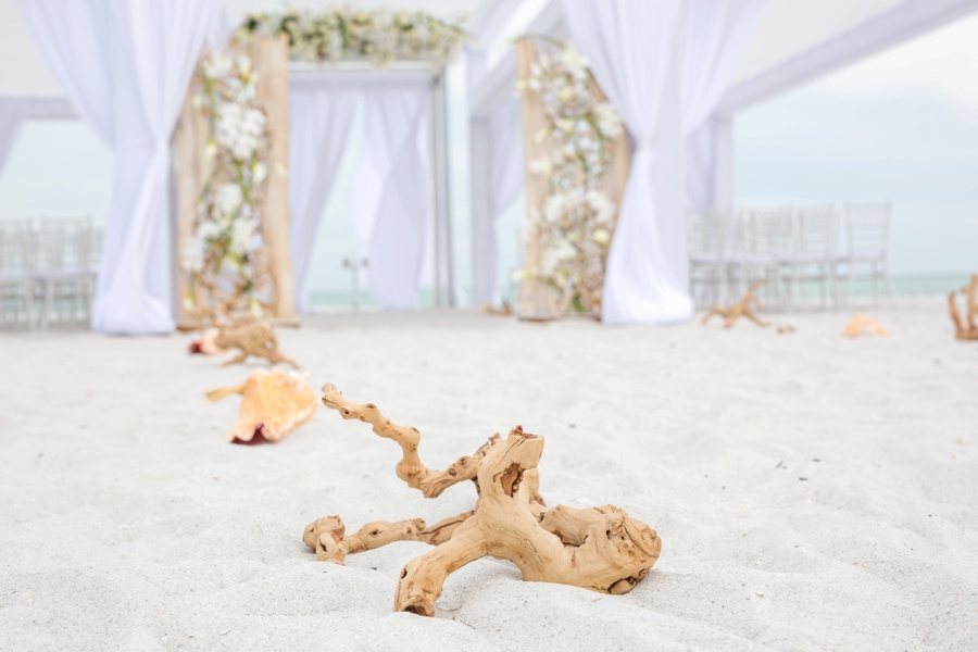 An Elegant & Luxe White Beach Wedding via TheELD.com