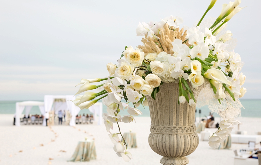 An Elegant & Luxe White Beach Wedding via TheELD.com