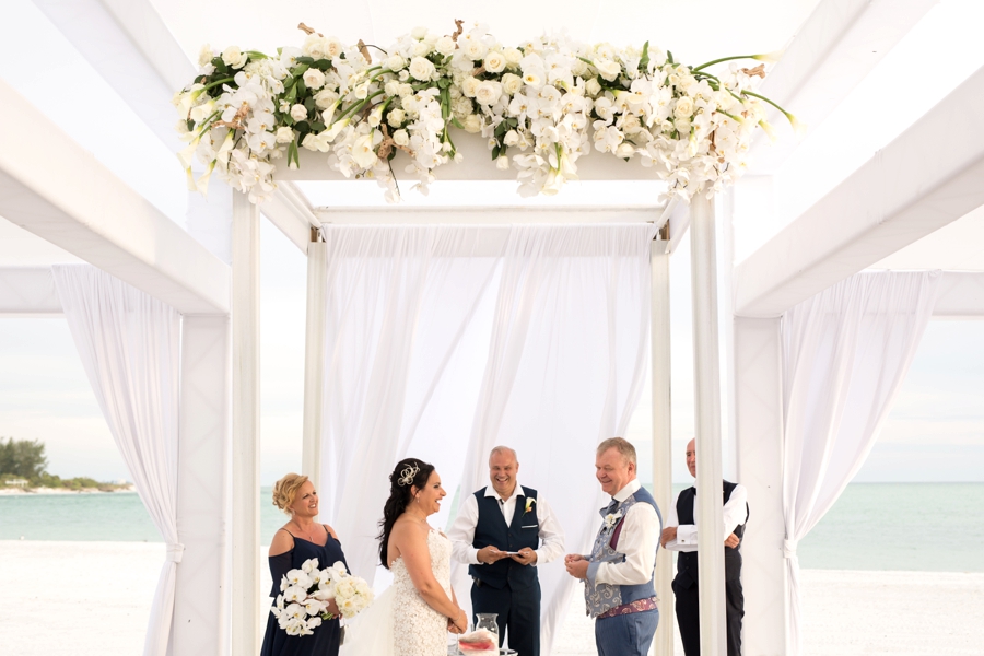 An Elegant & Luxe White Beach Wedding via TheELD.com