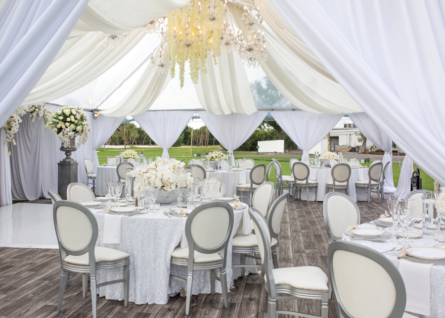 An Elegant & Luxe White Beach Wedding via TheELD.com