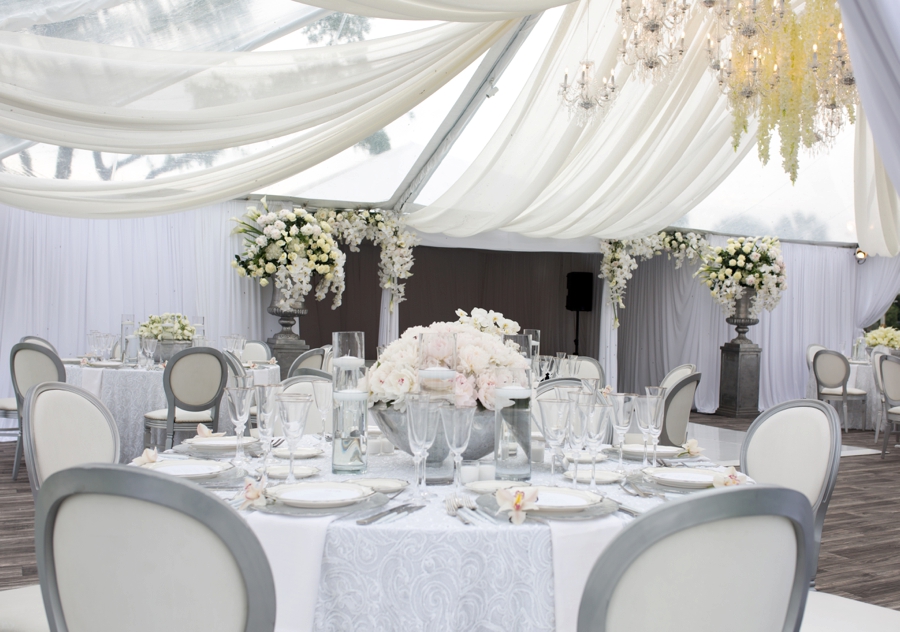 An Elegant & Luxe White Beach Wedding via TheELD.com