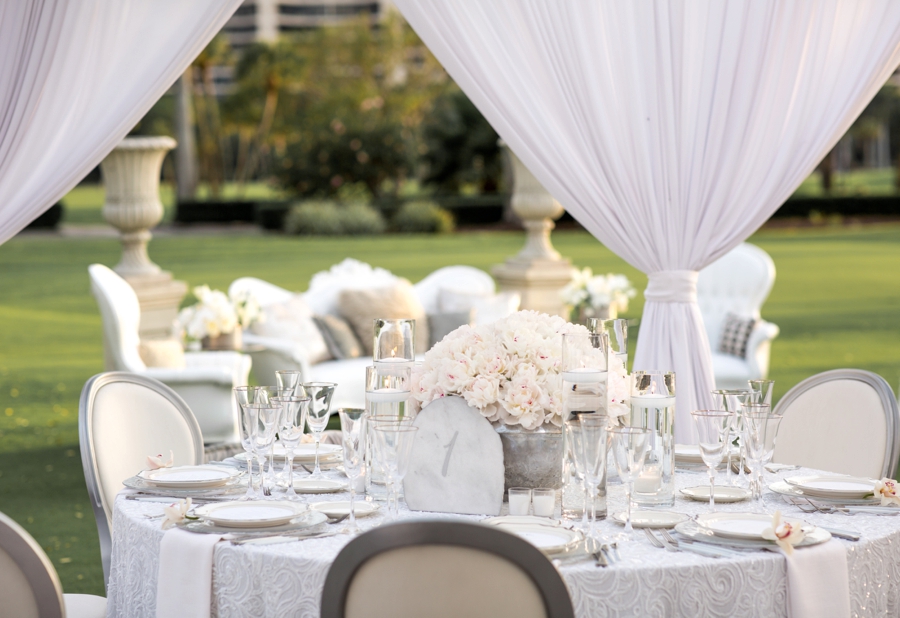 An Elegant & Luxe White Beach Wedding via TheELD.com