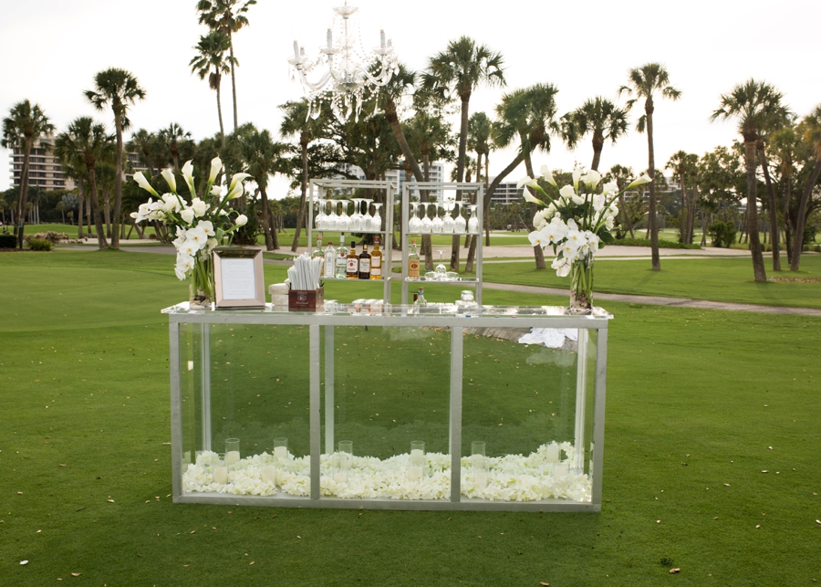 An Elegant & Luxe White Beach Wedding via TheELD.com