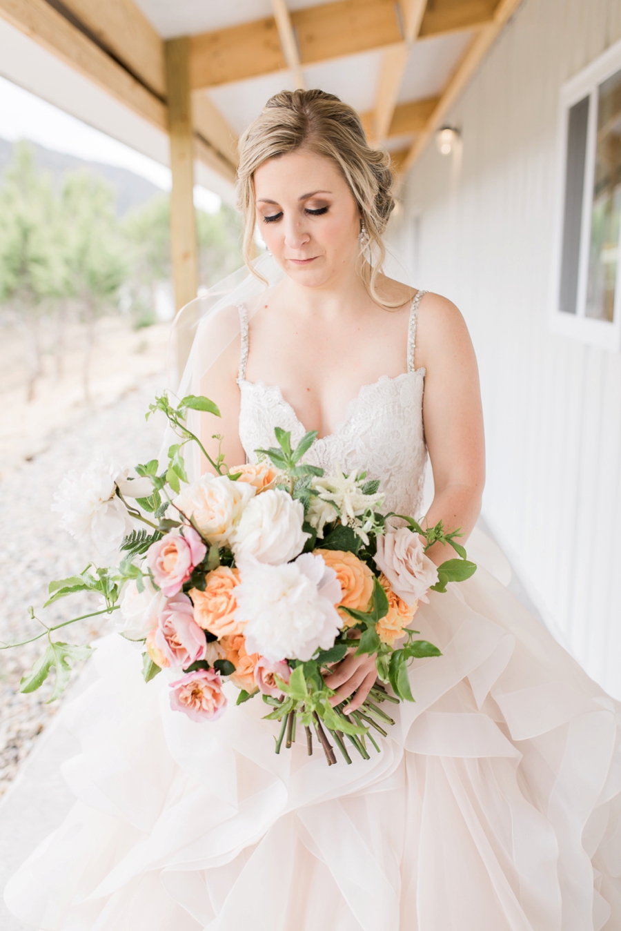 Blush & Peach Colorado Ranch Wedding via TheELD.com