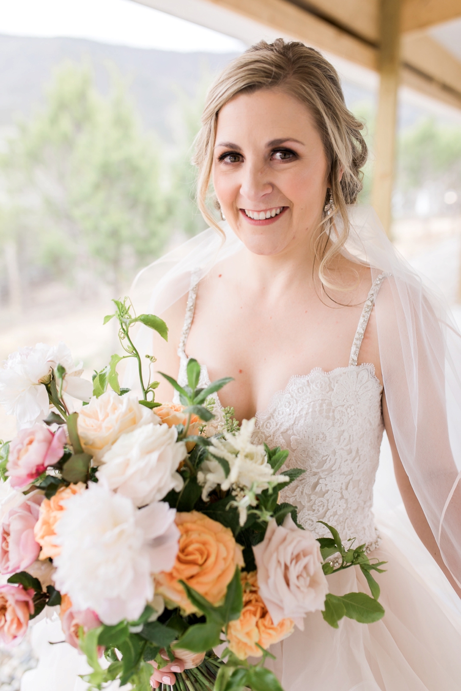 Blush & Peach Colorado Ranch Wedding via TheELD.com