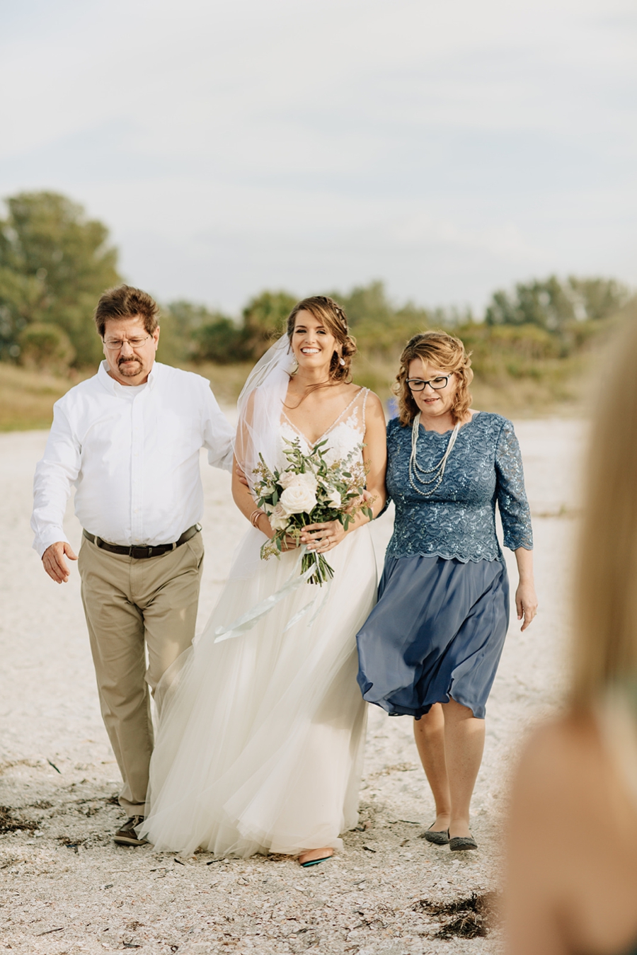 Organic Coastal Inspired Clearwater Beach Wedding via TheELD.com