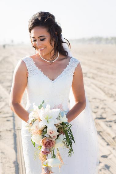 Intimate Oceanside Long Beach Wedding via TheELD.com