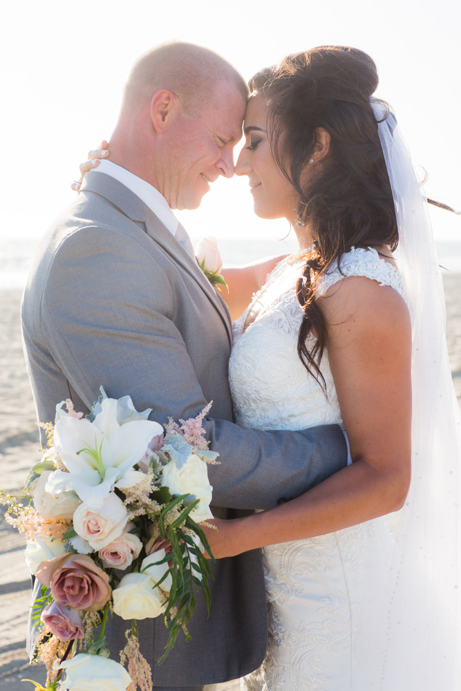 Intimate Oceanside Long Beach Wedding via TheELD.com