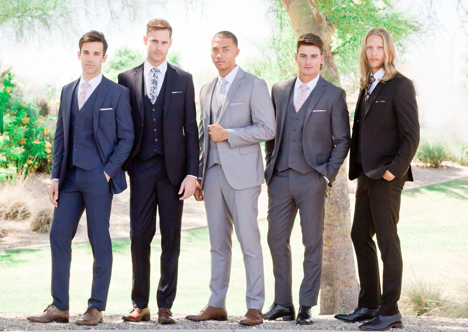 Groom in tuxedo groomsmen hotsell in suits